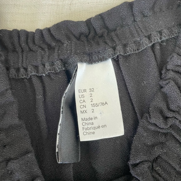 Off the shoulder black shirt. - Picture 2 of 2